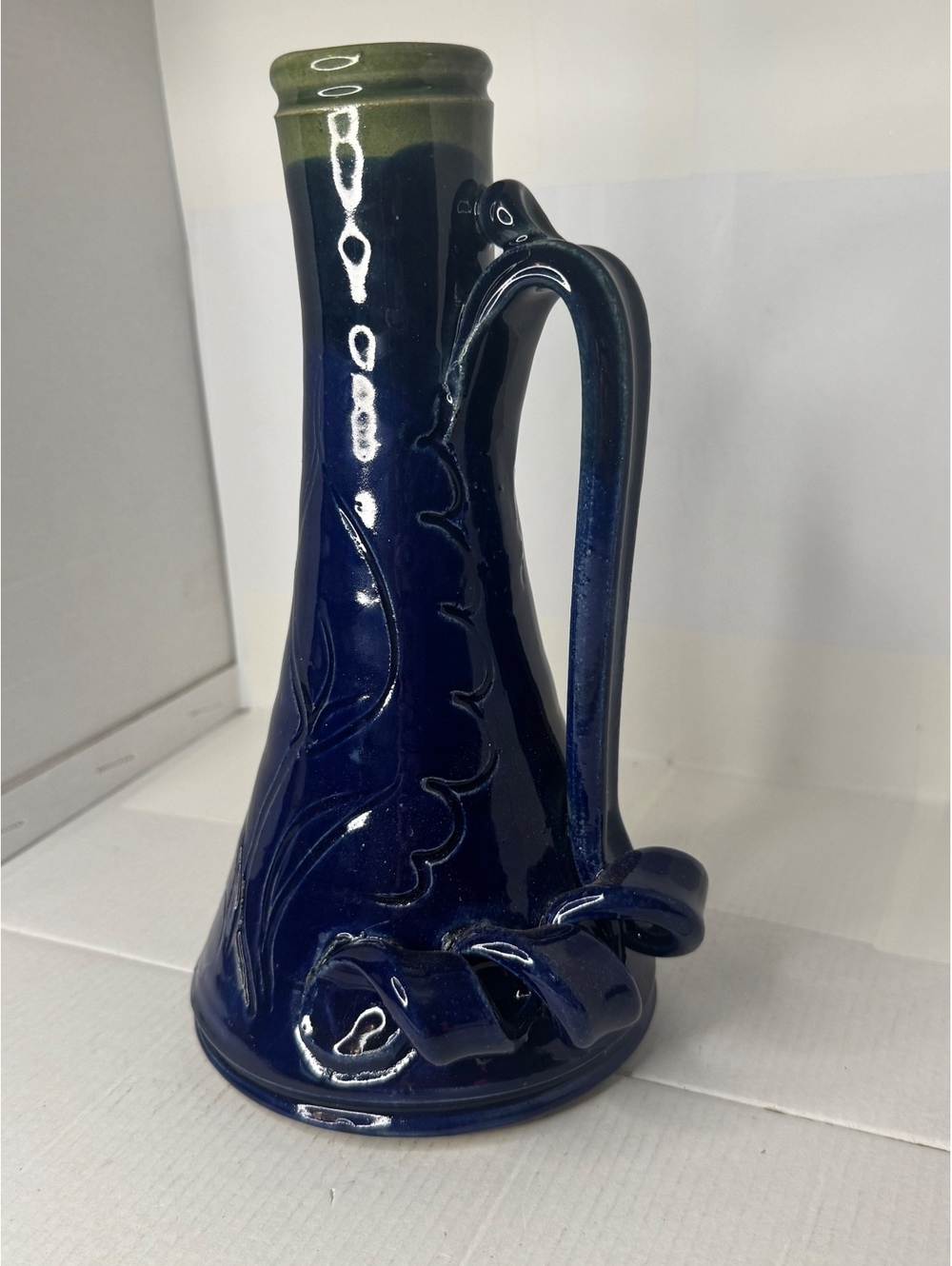 Blue pottery pitcher vase